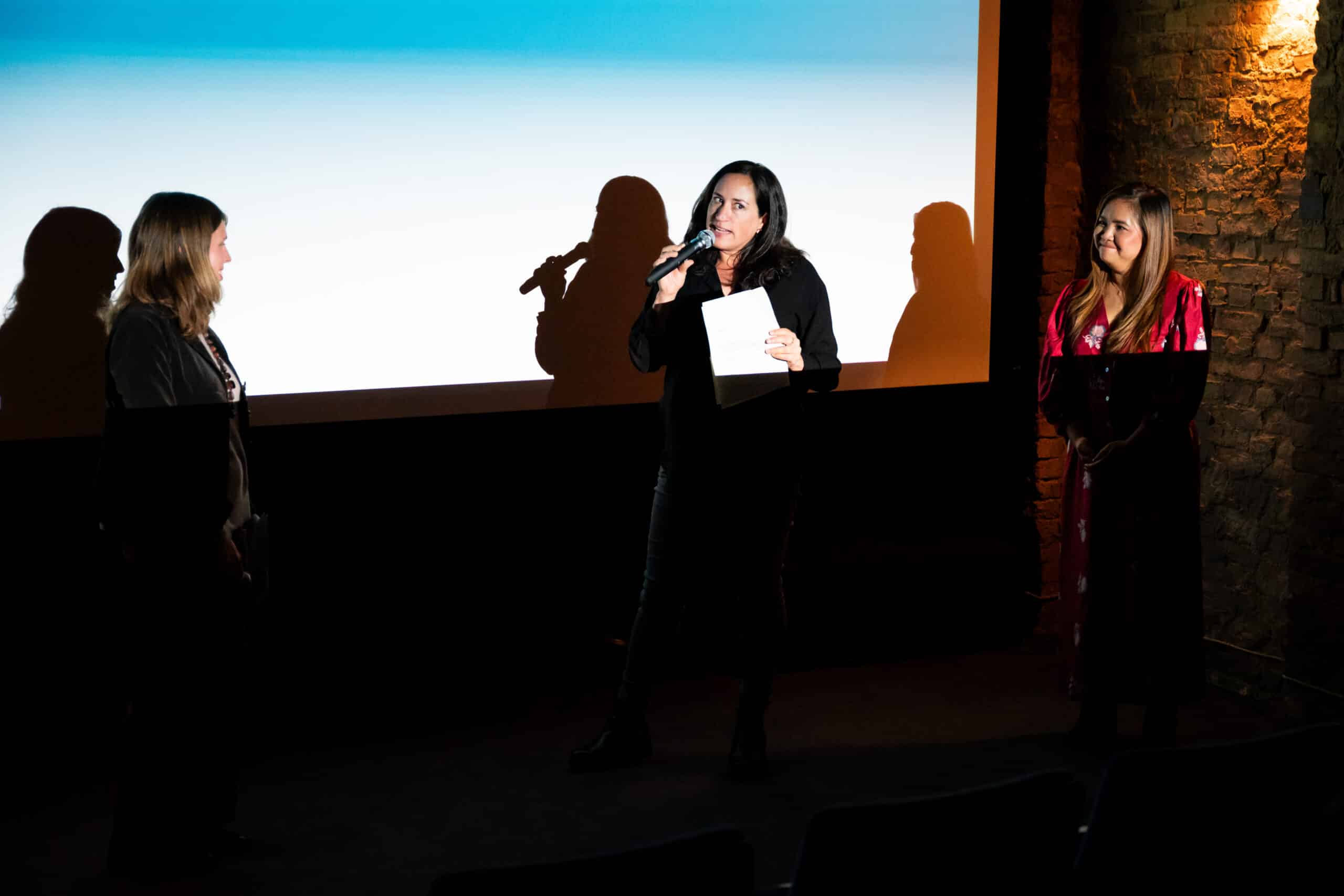 Sophia presenting at the Voices on the Move launch event at Il Kino, Berlin